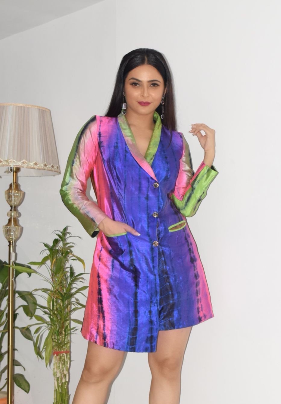 Freida Pinto in black dress with trophies